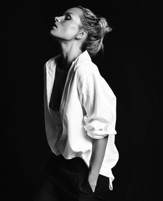 Elegant woman wearing Alex Laine contemporary made-to-measure garment – modern Yorkshire tailoring.